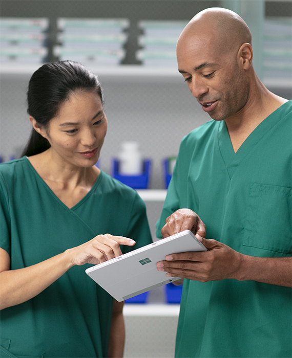 A pharmacist reviewing data from a Novum IQ infusion pump