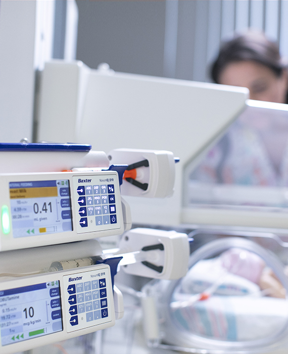 NICU Nurse tends to a newborn